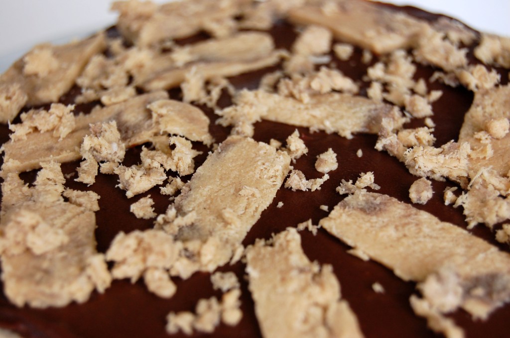 chocolate tahini cake with brown sugar, chocolate ganache, and halva filling