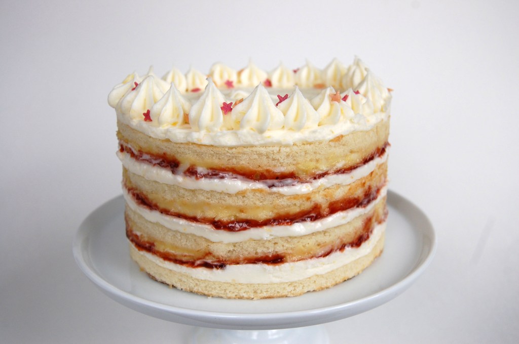 coconut cake with kaya, strawberry preserves, and lemon cream cheese&nbsp;buttercream